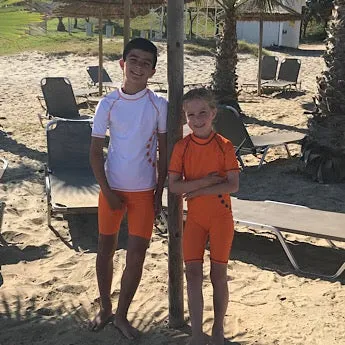 White/ orange short-sleeved rash top (zipped)